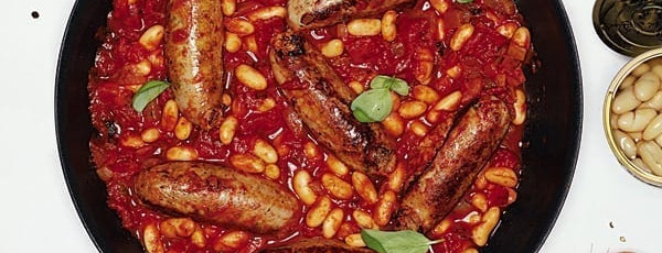 Creamy braised sausages with tomato and borlotti beans